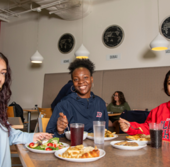 UIC Students enjoying meal at United Table in SCE
                  